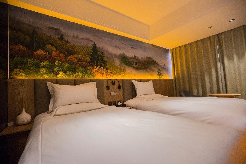 Qiu Guo Hotel Hua Mao Chaoyang  Exteriör bild